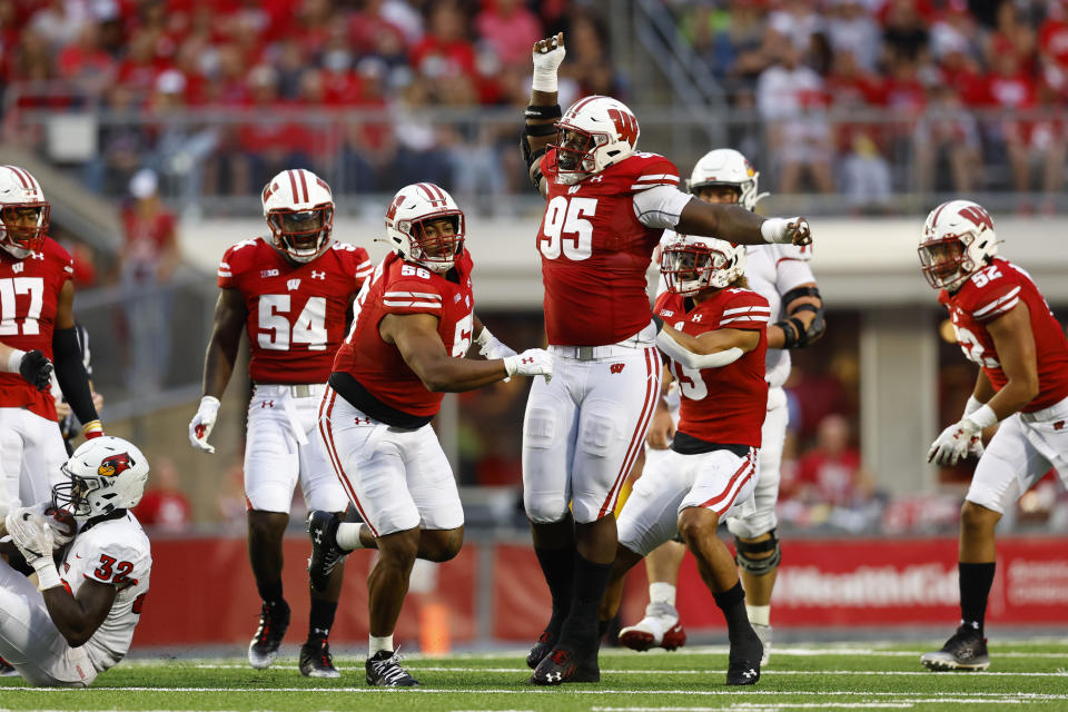 Sept. 3, 2022; Madison, Wisconsin; Wisconsin Badgers nose tackle Keeanu Benton (95) celebrates following a tackle during the second quarter against the Illinois State Redbirds at Camp Randall Stadium. Jeff Hanisch-USA TODAY Sports