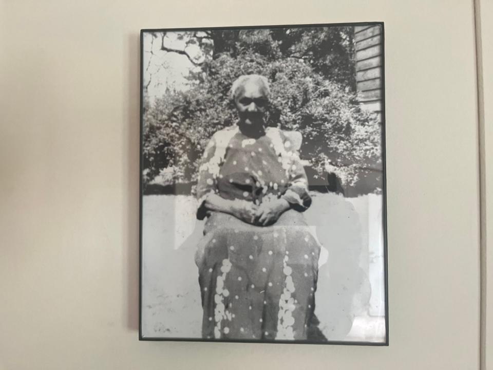 Bertha Hunt's great grandmother Alice Toney, born enslaved in Leonardtown, Maryland, passed down the tradition of Southern Maryland stuffed ham through seven generations of Bertha Hunt's family. Hunt keeps Toney's picture on the wall in her Leonardtown home.