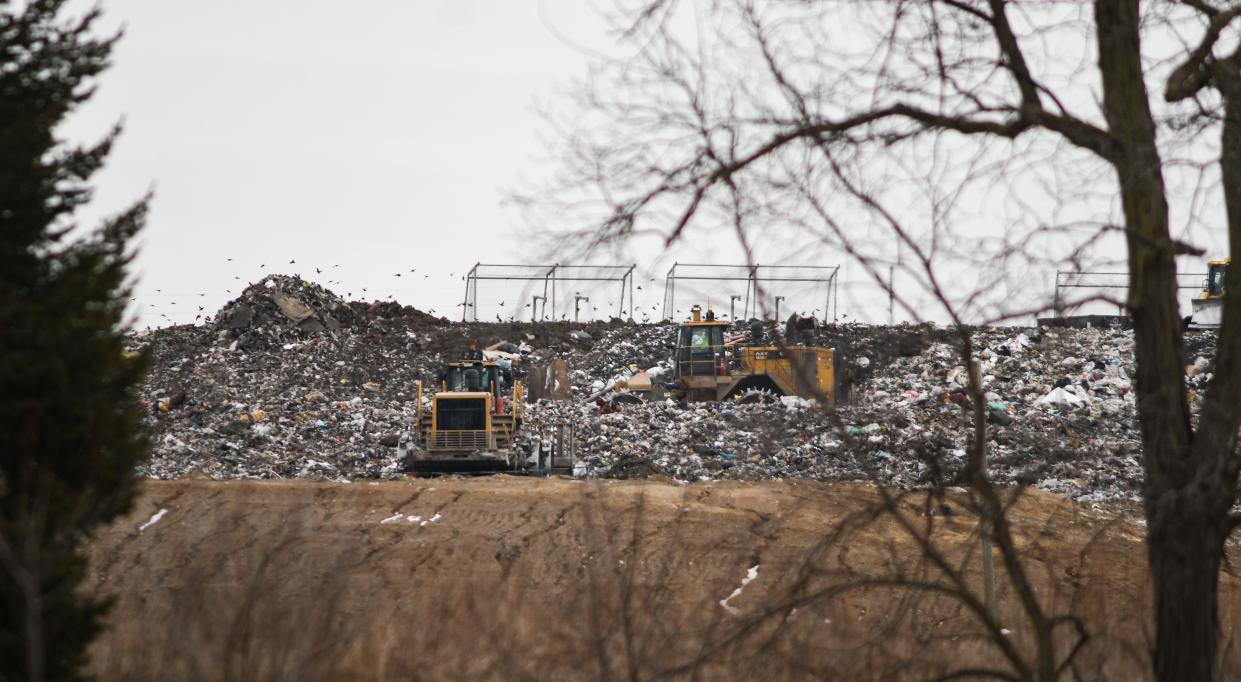 Garbage is moved Monday, Feb. 24, 2020, at the Granger landfill in Lansing.
