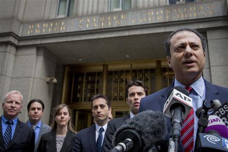 U.S. Attorney for the Southern District of New York Preet Bharara (R) speaks during a news conference about the verdict in the Abu Hamza al-Masri case outside the Manhattan Federal Courthouse in New York May 19, 2014. REUTERS/Brendan McDermid