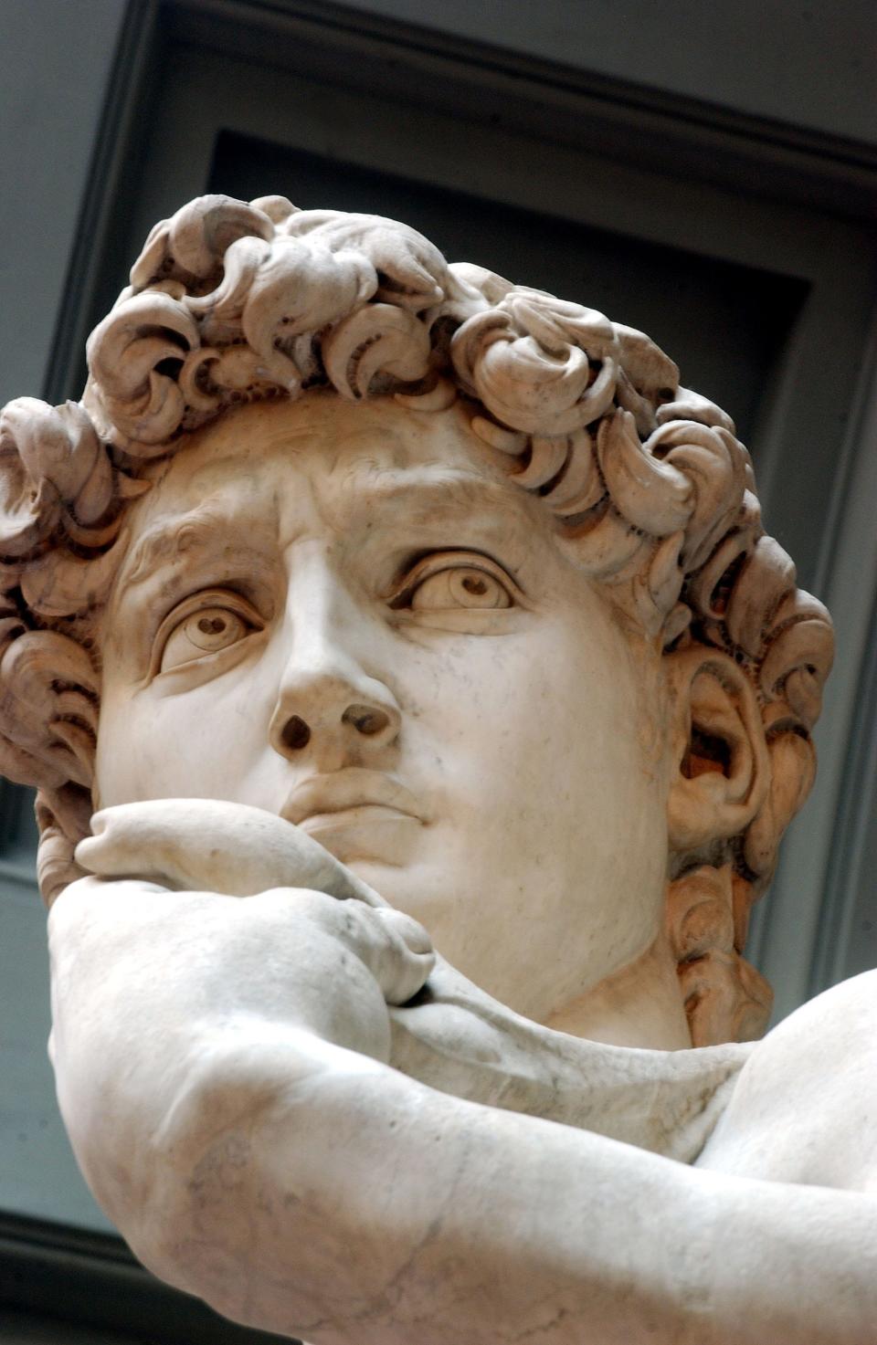 Restoration work on Michelangelo's masterpiece David is completed May 24, 2004 at the Galleria dell'Accademia in Florence, Italy. The work has taken a painstaking two years to complete with the statue going on show to the public May 25. (Photo by Franco Origlia/Getty Images)