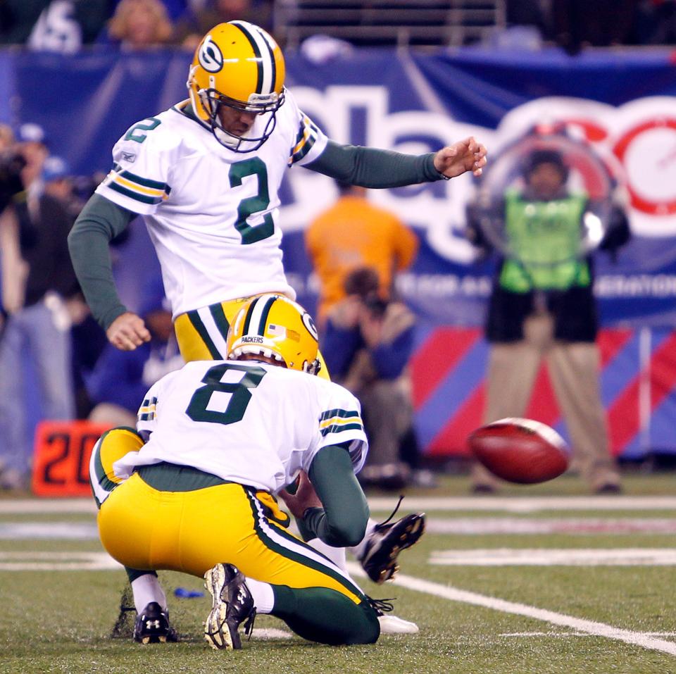 Mason Crosby kicks the winning field goal as time expires to help the Green Bay Packers defeat the New York Giants on Dec. 4, 2011.