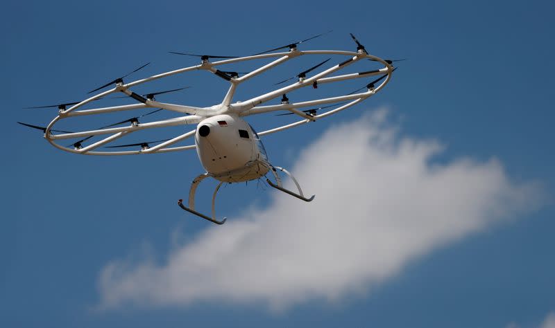 A Volocopter air-taxi performs a flight over Le Bourget airport