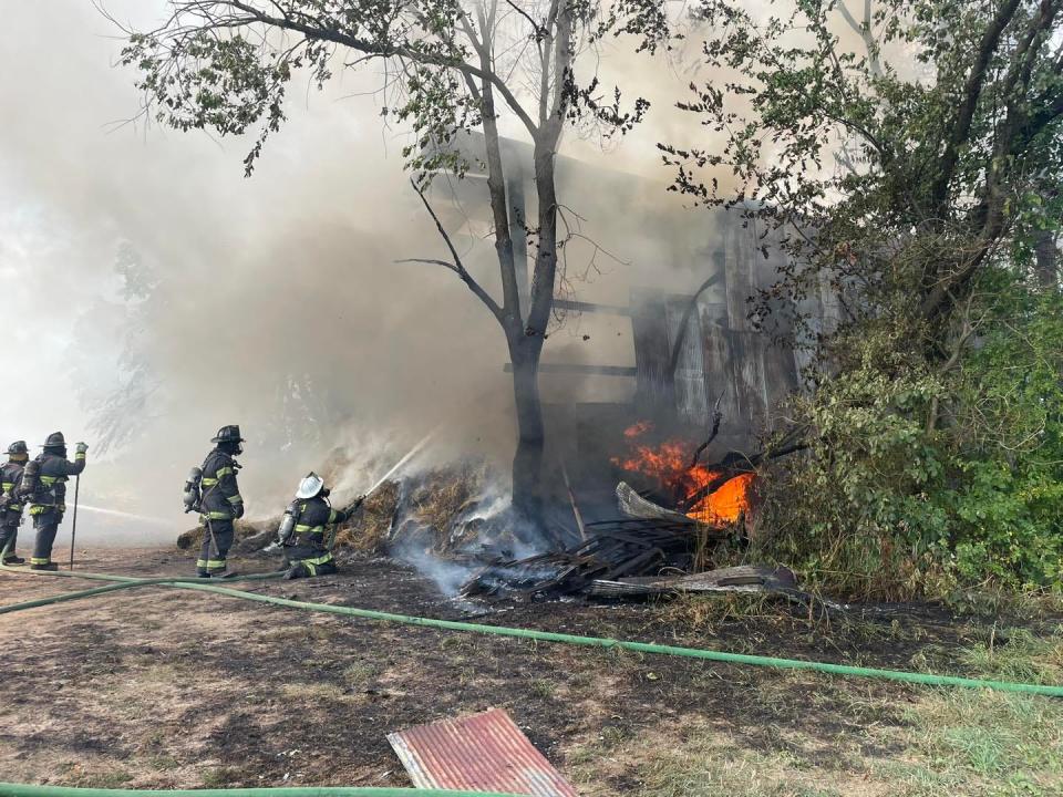 Firefighters work to put out a fire at a hay barn on Coldsmith Road, Greene Township, on Wednesday, July 17, 2024. Ray Coldsmith Jr., 40, of Shippensburg, is charged with arson in connection to the fire.