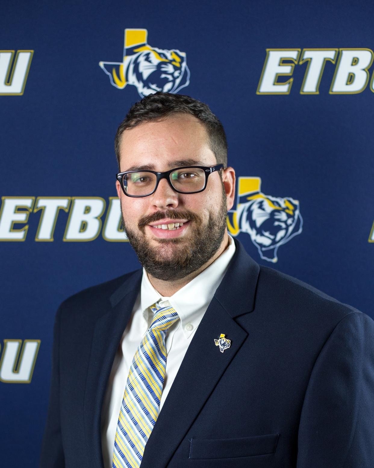 In this image provided by East Texas Baptist University (ETBU) Athletic Communications, shows Tyler James, when James was a graduate assistant coach for the ETBU golf program in Marshall, Texas. Nine people, including James, now University of the Southwest golf coach, and six students died in a fiery, head-on collision in West Texas on Tuesday evening, March 15, 2022, while returning home from a golf tournament, authorities said. (ETBU Athletic Communications via AP)