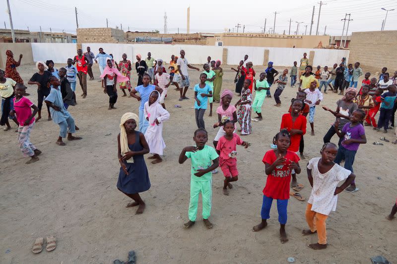 FILE PHOTO: Children from the Philip neighbourhood, dance, in Port Sudan