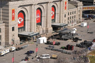 Workers dismantle the stage outside of Union Station Thursday, Feb. 15, 2024, in Kansas City, Mo. The venue was the site of a mass shooting Wednesday after a rally celebrating the Kansas City Chiefs winning the NFL Super Bowl 58 football game. (AP Photo/Charlie Riedel)