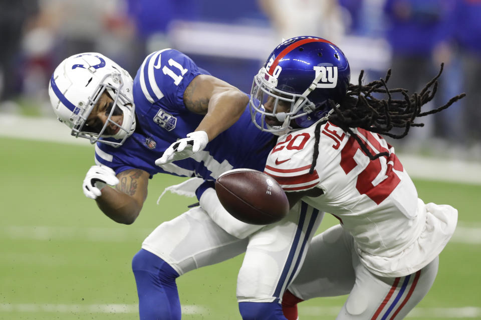 New York Giants cornerback Janoris Jenkins (20) breaks up a pass intended for Indianapolis Colts wide receiver Ryan Grant (11) during the first half of an NFL football game in Indianapolis, Sunday, Dec. 23, 2018. (AP Photo/Darron Cummings)