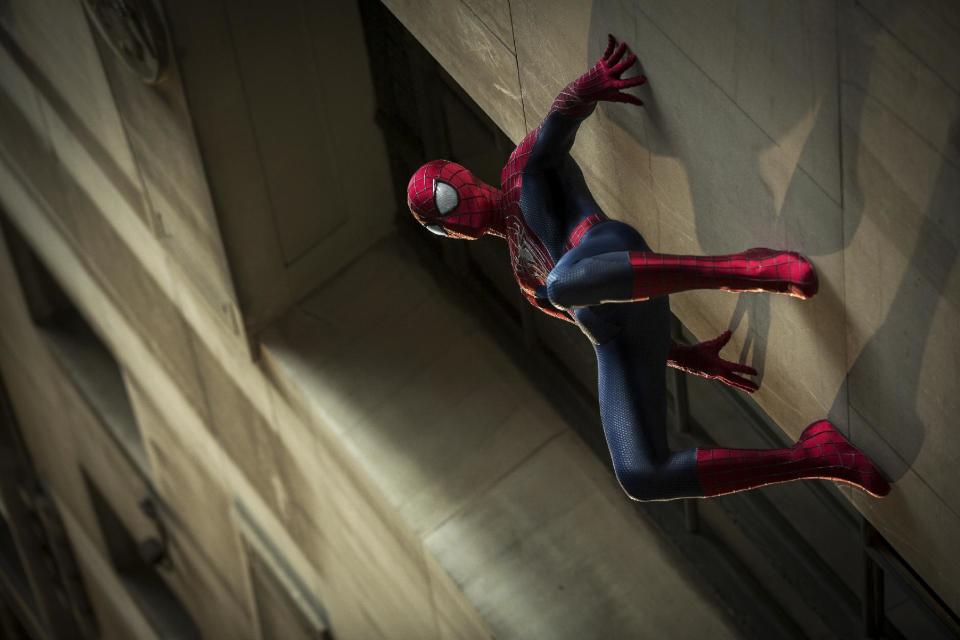 In this publicity photo released by Sony Pictures Entertainment, Andrew Garfield stars as Spider-Man in Columbia Pictures' "The Amazing Spider-Man 2," also starring Emma Stone. The film is in theaters May 2, 2014. (AP Photo/Sony Pictures Entertainment, Niko Tavernise)