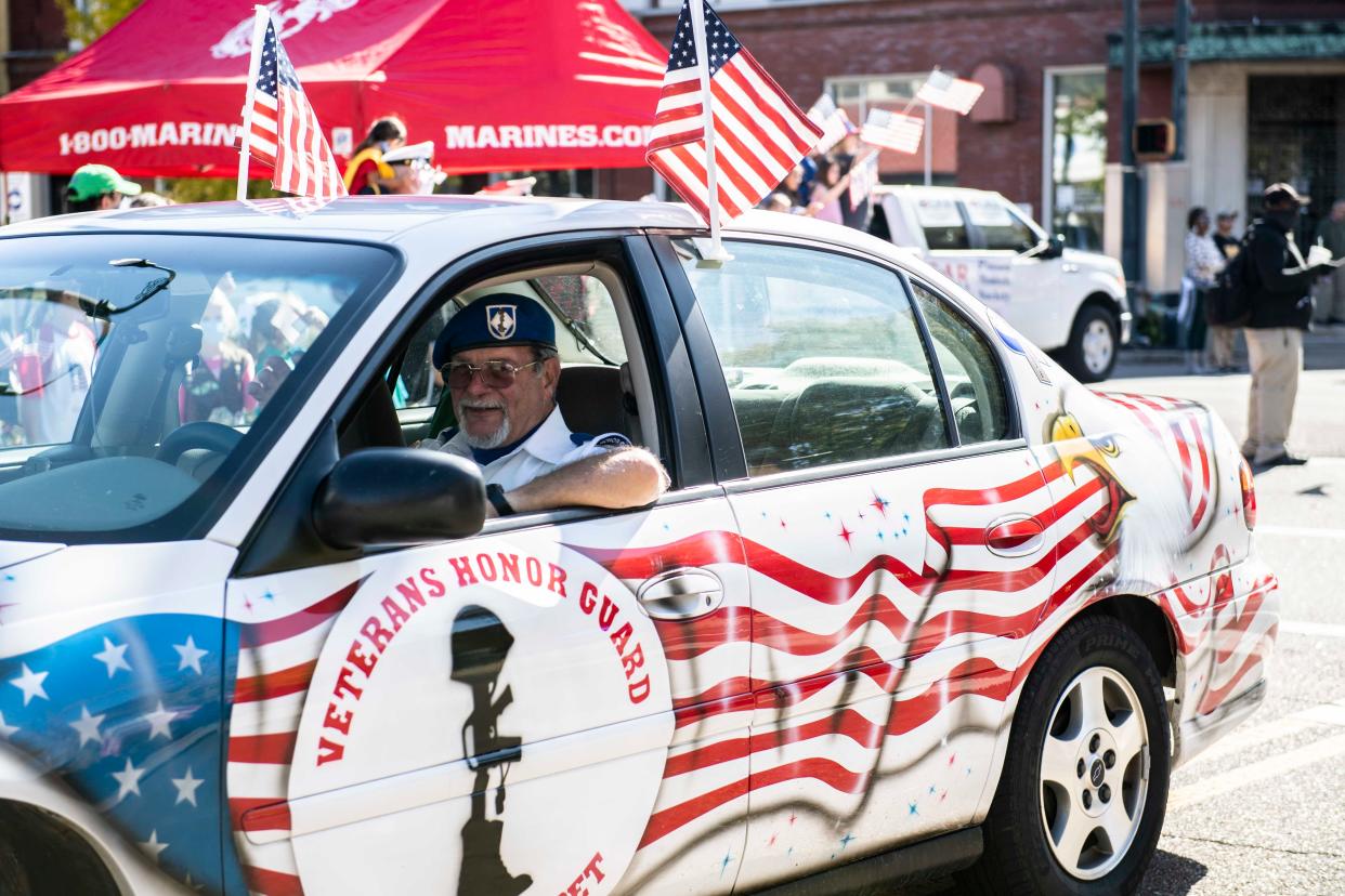 Veterans Day parade took place at Jackson Downtown in Jackson, Tenn., Saturday, Nov. 7, 2020. It was a reverse parade where the Veterans rode in their cars with their families and supporters would stand outside waving at them as they drove by.