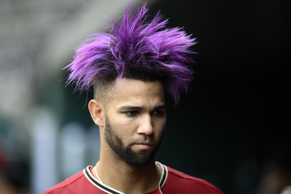 Arizona Diamondbacks' Lourdes Gurriel Jr. walks in the dugout before the third inning of a baseball game against the Washington Nationals, Thursday, June 22, 2023, in Washington. (AP Photo/Nick Wass)