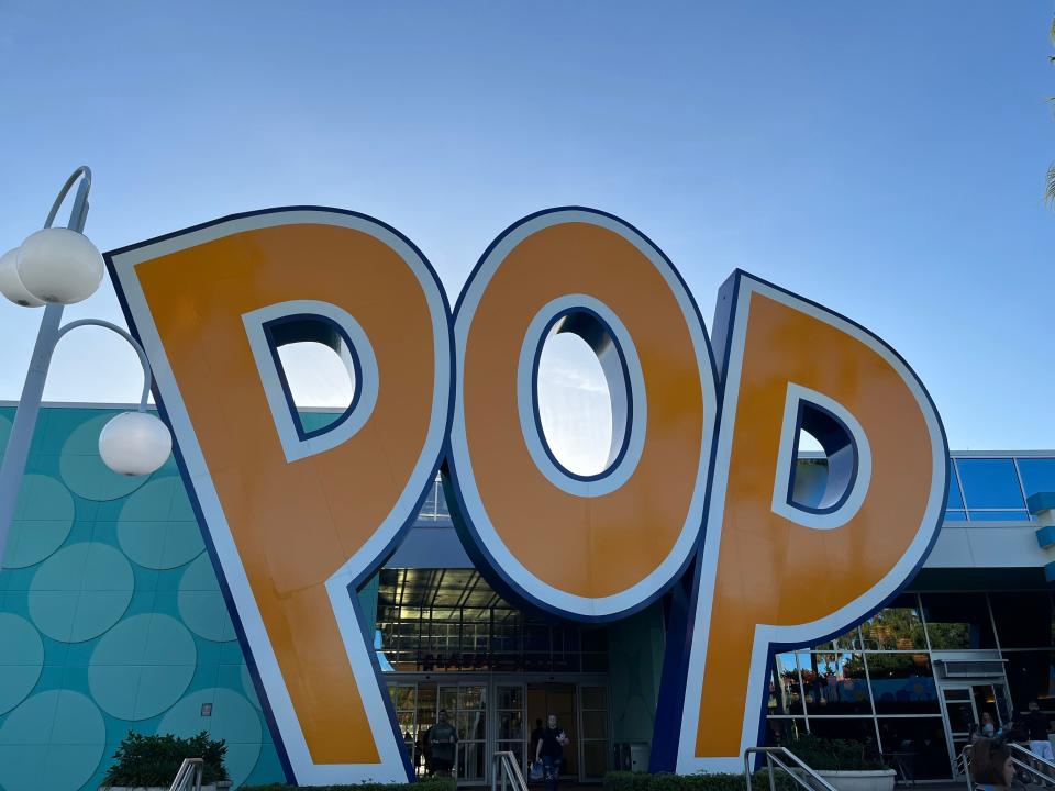 big "pop" sign outside pop century resort in disney world