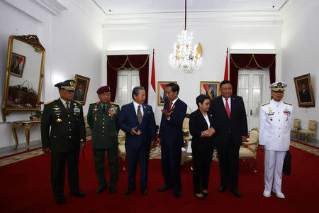 (L-R) Indonesian military chief General Gatot Nurmantyo, Malaysian Armed Forces General Tan Sri Zulkifeli Mohd , Malaysia's Foreign Minister Dato Sri Anifah Aman, Indonesia's President Joko Widodo, Indonesia's Foreign Minister Retno Marsudi, Philippine's Foreign Minister Jose Rene Almendras, and Philippine's Navy Chief Admiral Caesar C. Taccad chat before a meeting at The Gedung Agung in Yogyakarta, Indonesia, May 5, 2016. ANTARA FOTO/Andreas Fitri Atmoko/via REUTERS ATTENTION EDITORS - THIS IMAGE WAS PROVIDED BY A THIRD PARTY. FOR EDITORIAL USE ONLY. MANDATORY CREDIT. INDONESIA OUT.