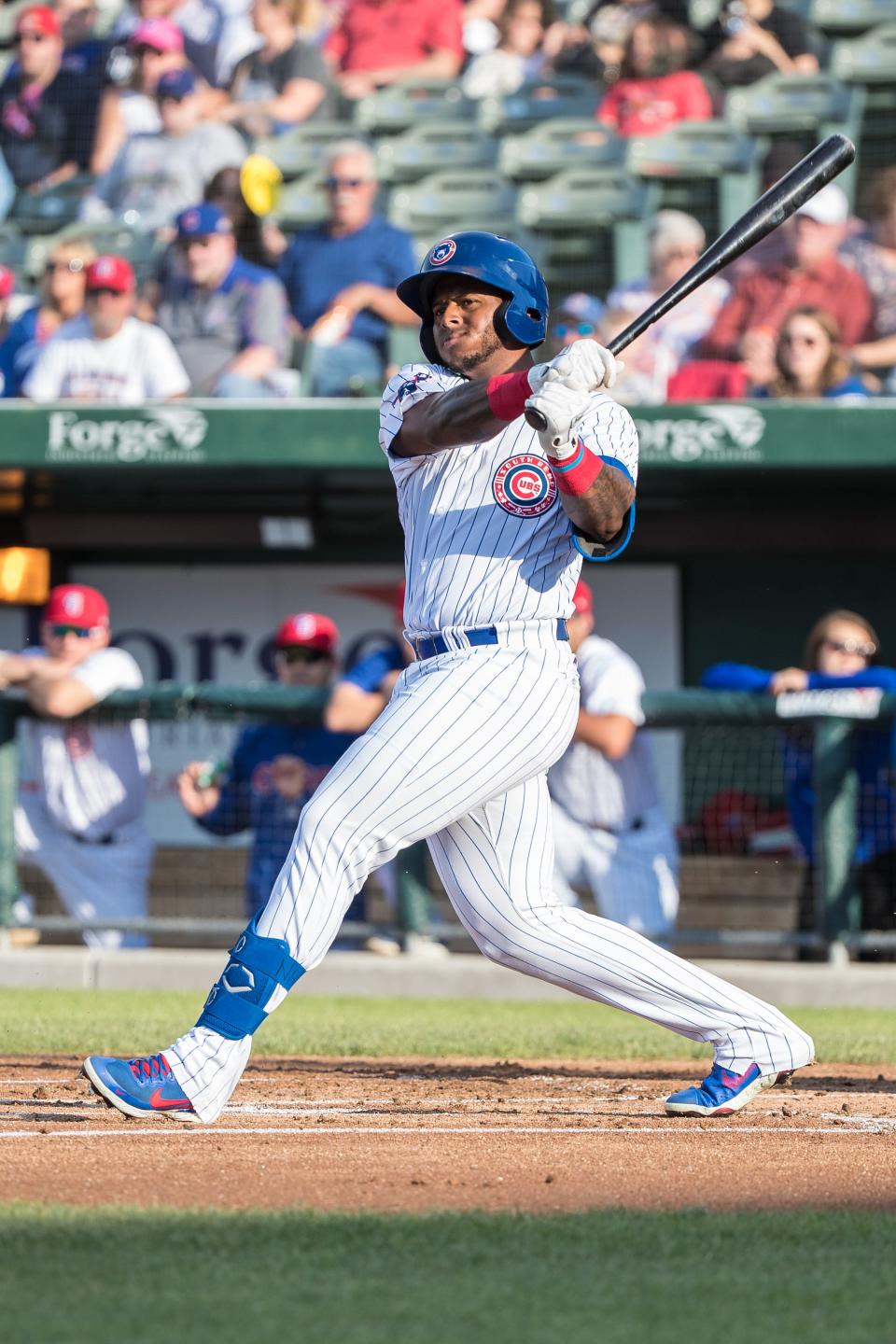 The Chicago Cubs are calling up outfielder Nelson Velazquez from Iowa.