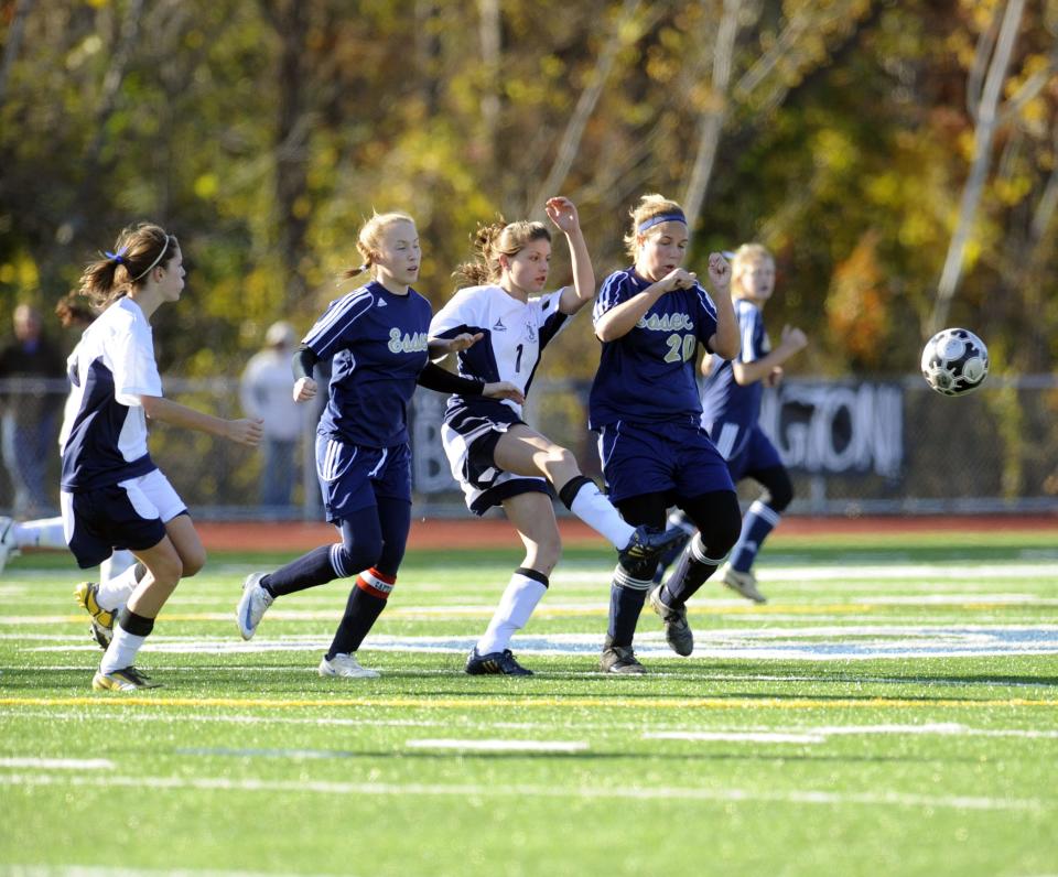 Burlington and Essex battle for the ball during the second half at the VPA's Division I championship game on Saturday, November 1, 2008.