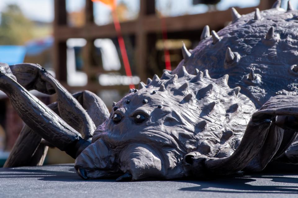 A giant, fake spider sits at the 2022 Treats on the Trail event hosted by the Guernsey County Community Development Corp. The event takes place this year from 2 to 4 p.m. on Oct. 21 at the Lore City trailhead to the Great Guernsey Trail.