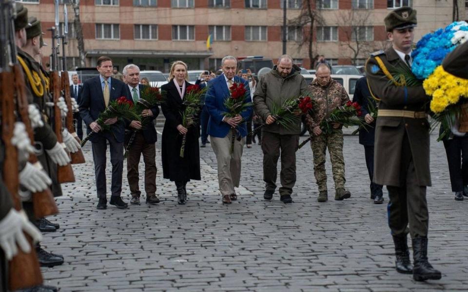 US Senator Chuck Schumer, Ukraine's Defence Minister Rustem Umerov and Chief of the Ukrainian Armed Forces Col Gen Oleksandr Syrskyi pay tribute to fallen Ukrainian service members