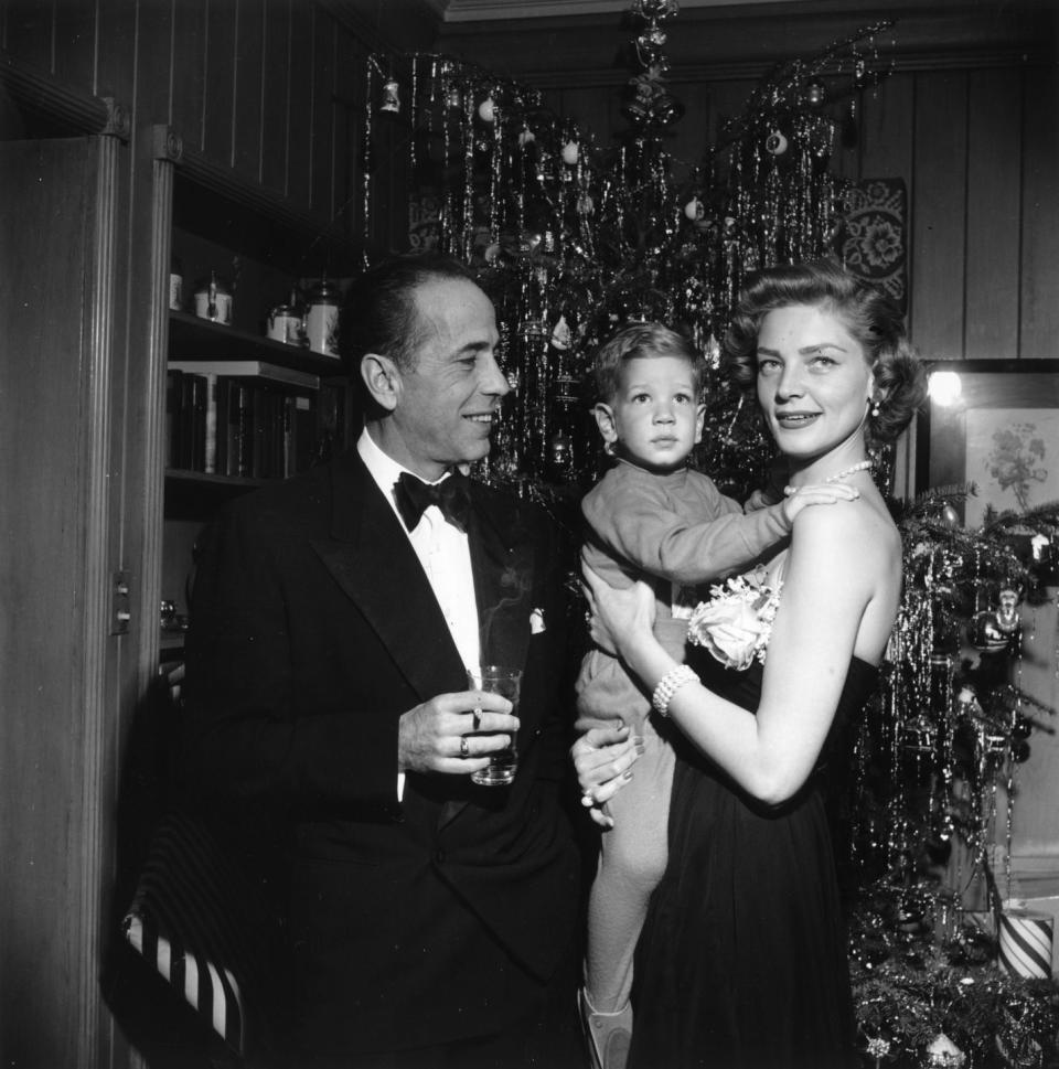 <p>Hollywood golden couple, Lauren Bacall and Humphrey Bogart, celebrate Christmas Eve with their son, Stephen Bogart, in their home in California.</p>