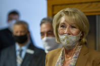 U.S. Education Secretary Betsy DeVos speaks to members of the media while visiting Sacred Heart Academy in Grand Rapids on Monday, Sept. 14, 2020. (Cory Morse/The Grand Rapids Press via AP)