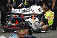 <p>People are treated for their injuries on the street after a New Jersey Transit train crashed into the platform at Hoboken Terminal during morning rush hour September 29, 2016 in Hoboken, New Jersey. (Eduardo Munoz Alvarez/Getty Images) </p>