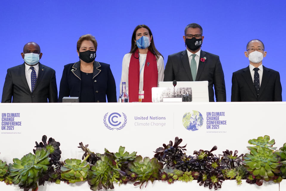 Dr. Hoesung Lee, chair of the IPCC (Intergovernmental Panel on Climate Change), Alok Sharma, President of the COP26 summit, outgoing COP president Carolina Schmidt, Patricia Espinosa, UNFCCC Executive-Secretary and UNGA President Abdulla Shahid, from right, attend the Procedural Opening of the COP26 U.N. Climate Summit in Glasgow, Scotland, Sunday, Oct. 31, 2021. The U.N. climate summit in Glasgow formally opens Sunday, a day before leaders from around the world gather in Scotland's biggest city to lay out their vision for addressing the common challenge of global warming. (AP Photo/Alberto Pezzali, Pool)