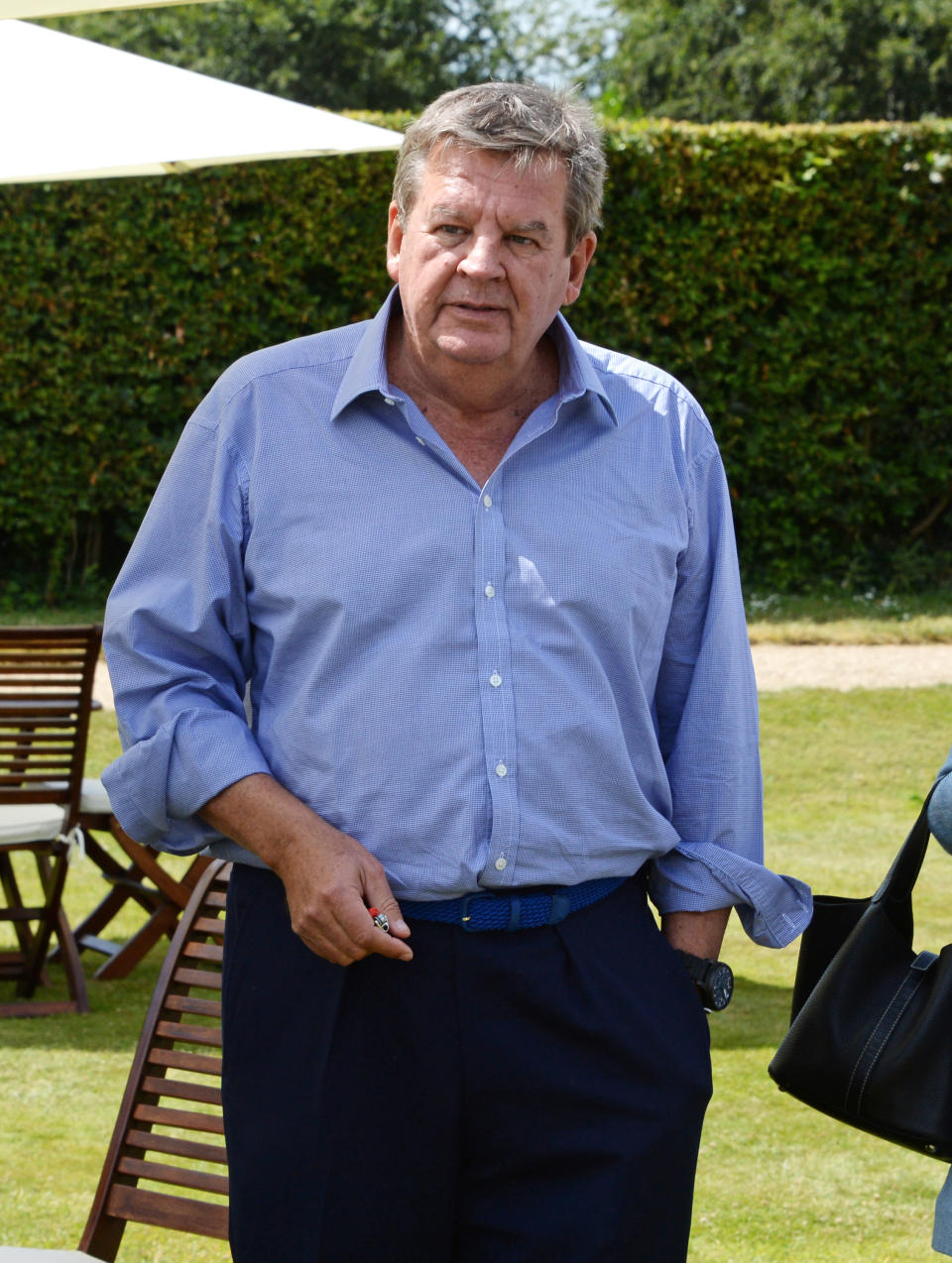 CHICHESTER, ENGLAND - JUNE 29:  Johann Rupert attends the Cartier Style & Luxury Lunch at the Goodwood Festival of Speed on June 29, 2014 in Chichester, England.  (Photo by David M. Benett/Getty Images)