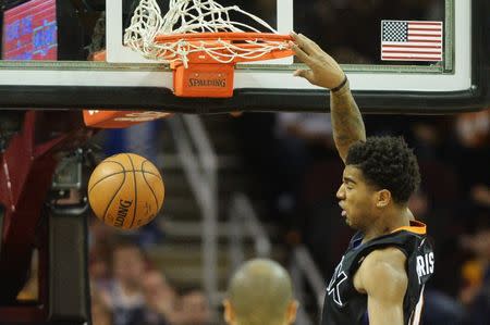 Jan 19, 2017; Cleveland, OH, USA; Phoenix Suns forward Marquese Chriss (0) slam dunks during the first quarter against the Cleveland Cavaliers at Quicken Loans Arena. Mandatory Credit: Ken Blaze-USA TODAY Sports