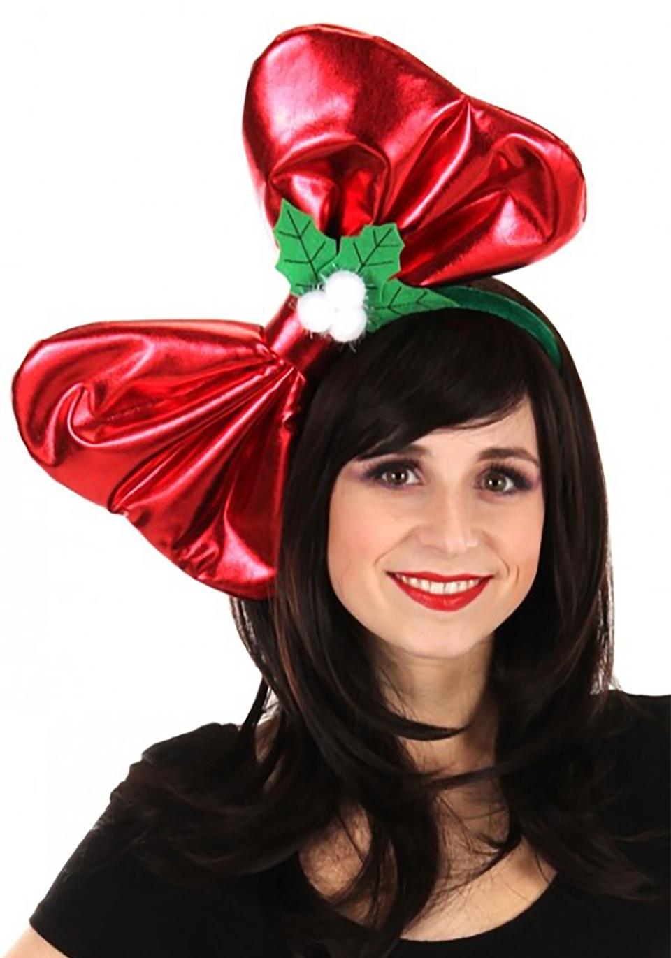 "Wow! That's a<a href="https://www.halloweencostumes.com/giant-christmas-bow-headband.html" target="_blank" rel="noopener noreferrer"> really big bow</a> on your head."<br />"Thank you!"<br />"I mean, it's really a large bow."<br />"Yes, yes it is."<br />"So, is there anything else interesting about you about besides this really large bow on your head?"<br />"Not really!"