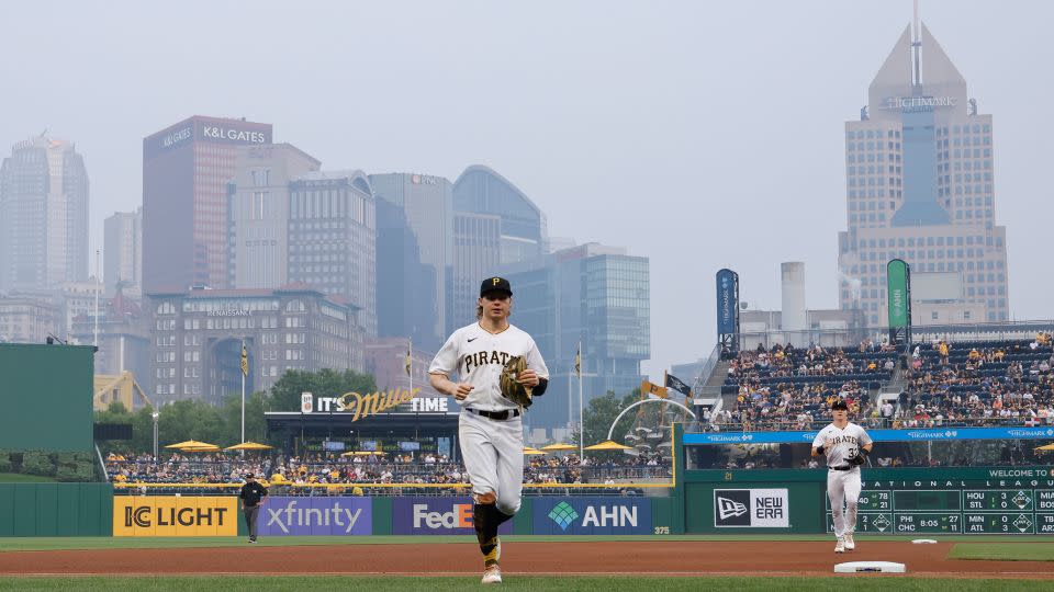 Pittsburgh Pirates play as smoke from wildfires in Canada descends on the downtown skyline in Pittsburgh on Wednesday. - Joe Robbins/Icon Sportswire/AP