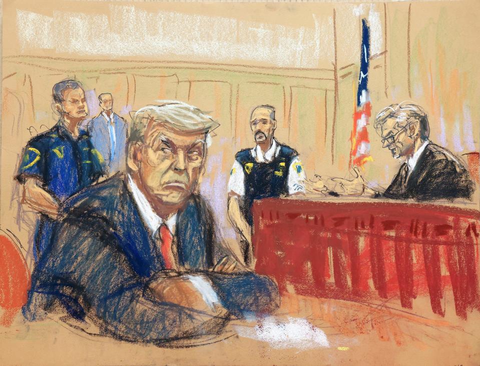 Former President Donald Trump looks over his shoulder in court for an arraignment. Justice Juan Merchan and two security personnel are seen in the background.
