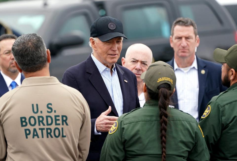 President Joe Biden, flanked by Homeland Security Secretary Alejandro Mayorkas, receives a briefing at the US-Mexico border in Brownsville, Texas (REUTERS)
