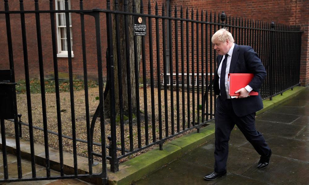 Boris Johnson walks out of Downing Street on 23 January