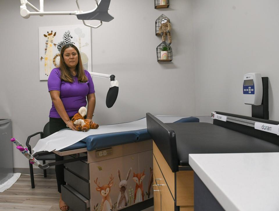 Stephanie Castellanos, executive director of the Children’s Advocacy Center, stands inside their new examination room inside their office in St. Lucie West on Friday Nov. 17, 2023. Since the budget cut the CDC is searching for ways to find new money to replace the budget cut or face cuts in child services, operational costs and salaries.