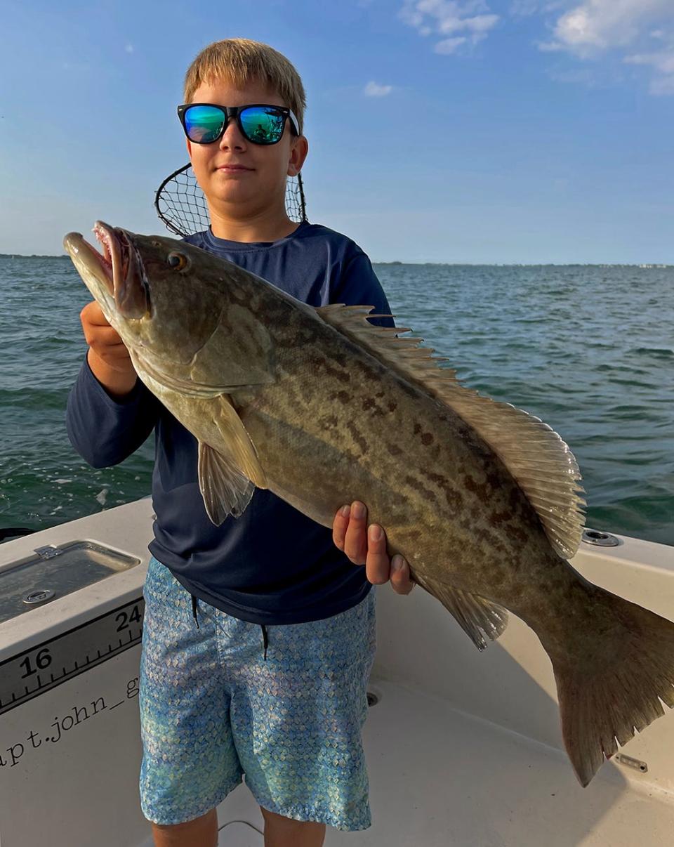 Jadas Runyon, 12, of Lakeland caught this 30-inch gag grouper while trolling in lower Tampa Bay with Capt. Capt. John Gunter this week.