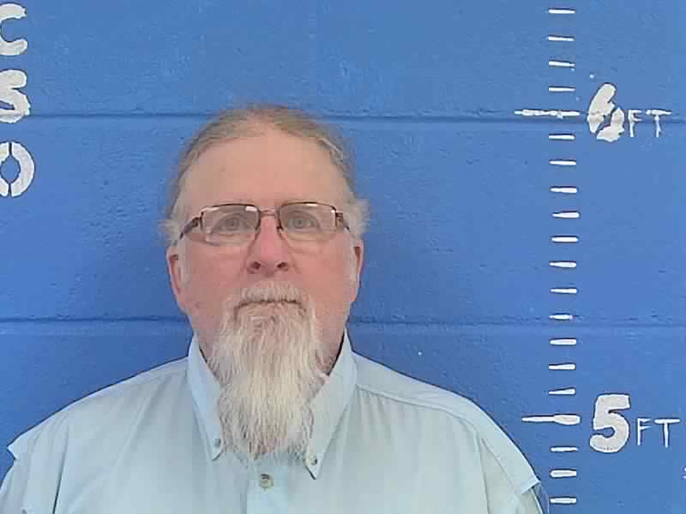 FILE - Gregory Charles Case, of Brookhaven, Miss., is shown in a Feb. 1, 2022, jail booking photo from the Lincoln County Sheriff's Department. A Black delivery driver accused Case and his son Brandon Case of shooting toward him on Jan. 24, 2022. The father and son are set to go on trial starting Tuesday, Aug. 15, 2023, on charges of attempted first-degree murder, conspiracy and shooting into the vehicle. (Lincoln County, Miss., Sheriff's Department via AP, File)