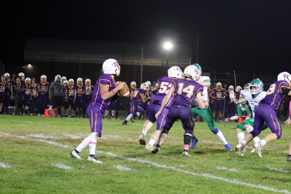 Monty Tech quarterback Dylan Huntoon (No. 7) looks for a receiver during a game against Sutton on Friday, October 6, 2023. Sutton won, 21-8.