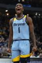 Marquette's Kam Jones reacts to a basket during the first half of an NCAA basketball game Tuesday, Nov. 29, 2022, in Milwaukee. (AP Photo/Morry Gash)