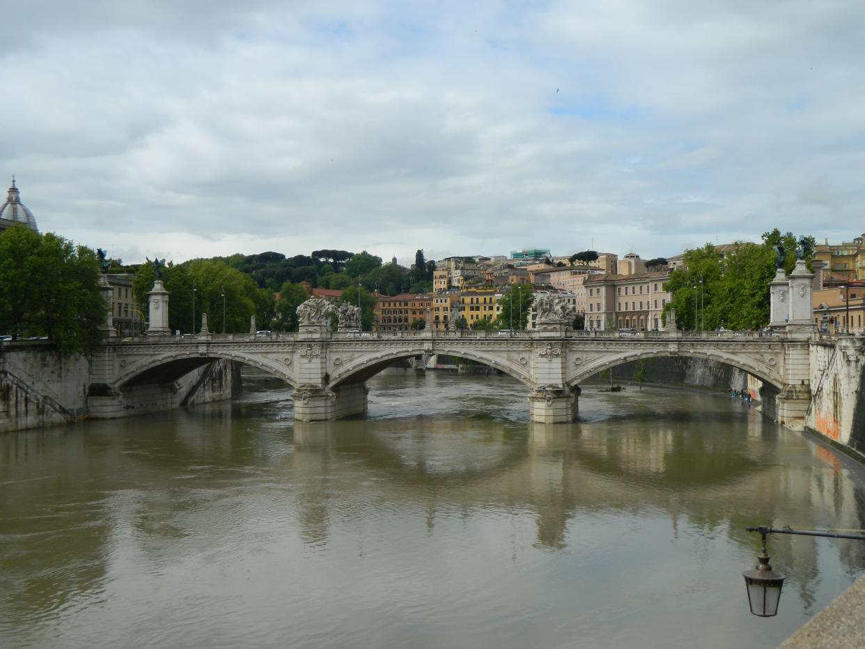 The Tiber river in Rome, Italy on a slightly overcast day.