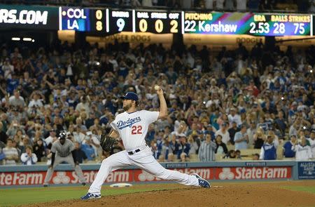 Los Angeles Dodgers starting pitcher Clayton Kershaw (22) throws in the ninth inning of the game against the Colorado Rockies at Dodger Stadium. Jayne Kamin-Oncea-USA TODAY Sports