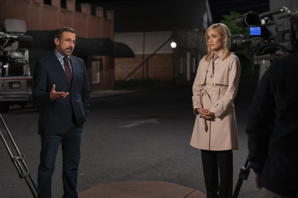 In this image released by Focus Features, Steve Carell, left, and Rose Byrne appear in a scene from "Irresistible." (Daniel McFadden/Focus Features via AP)