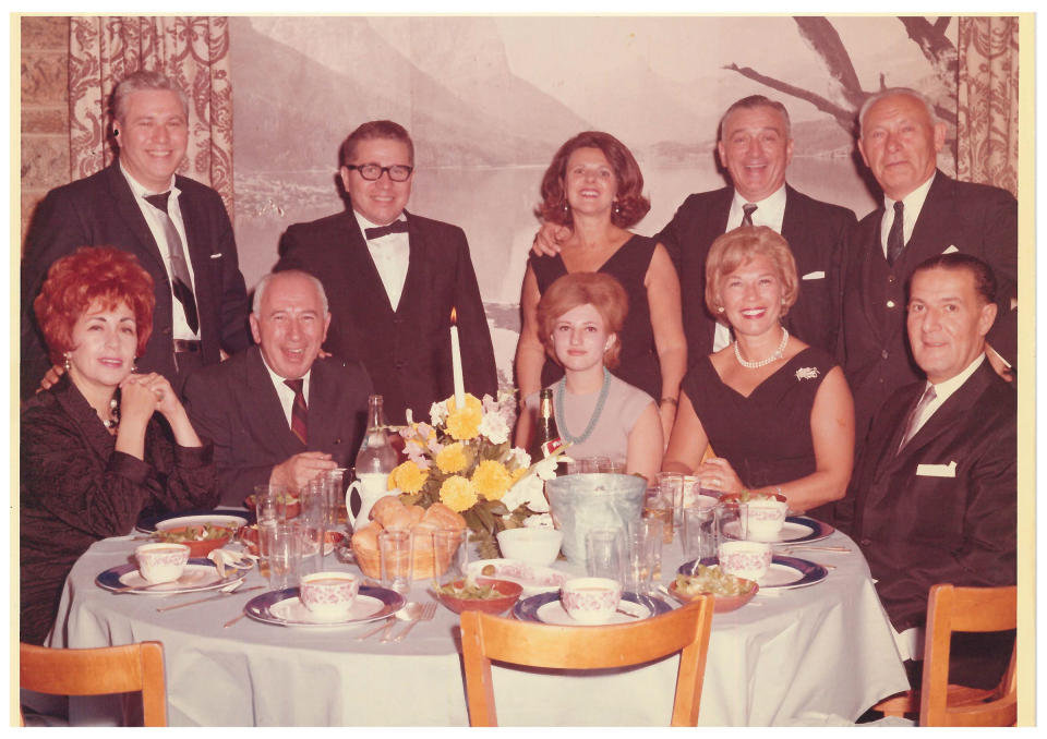 Torron, then 18 (bottom row center), seated next to her father Benjamin at a cousin's bar mitzvah in 1964; her family discovered the photo after being contacted by TIME.<span class="copyright">Courtesy the Fine FamilyEllen</span>