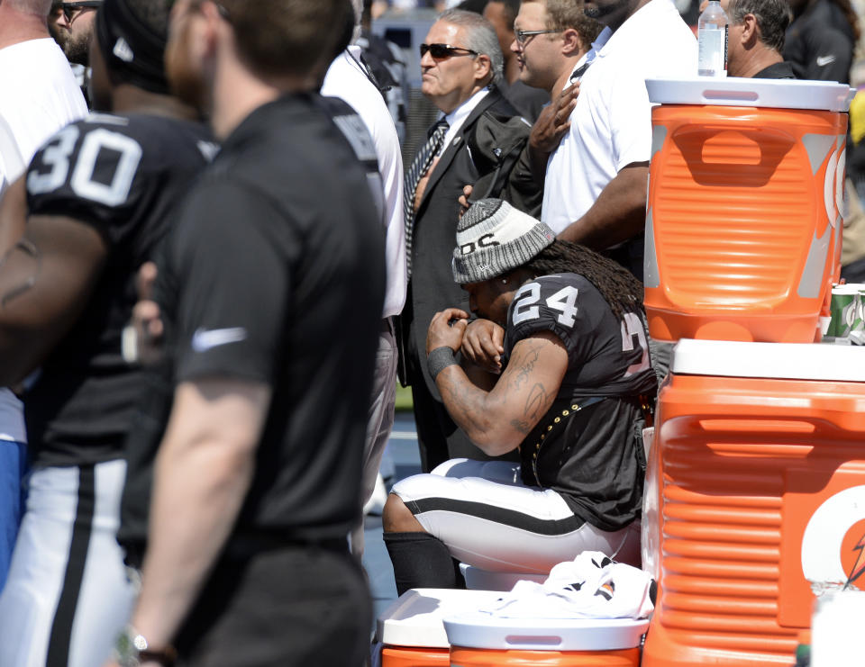 <p>Oakland Raiders running back Marshawn Lynch (24) sits during the national anthem before an NFL football game between the Raiders and the Tennessee Titans Sunday, Sept. 10, 2017, in Nashville, Tenn. (AP Photo/Mark Zaleski) </p>