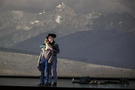 American tenor Tom Randle (Jack Twist) (L), and Canadian bass-baritone Daniel Okulitch (Ennis del Mar), perform during a dress rehearsal of the opera "Brokeback Mountain" at the Teatro Real in Madrid, January 24, 2014. REUTERS/Paul Hanna