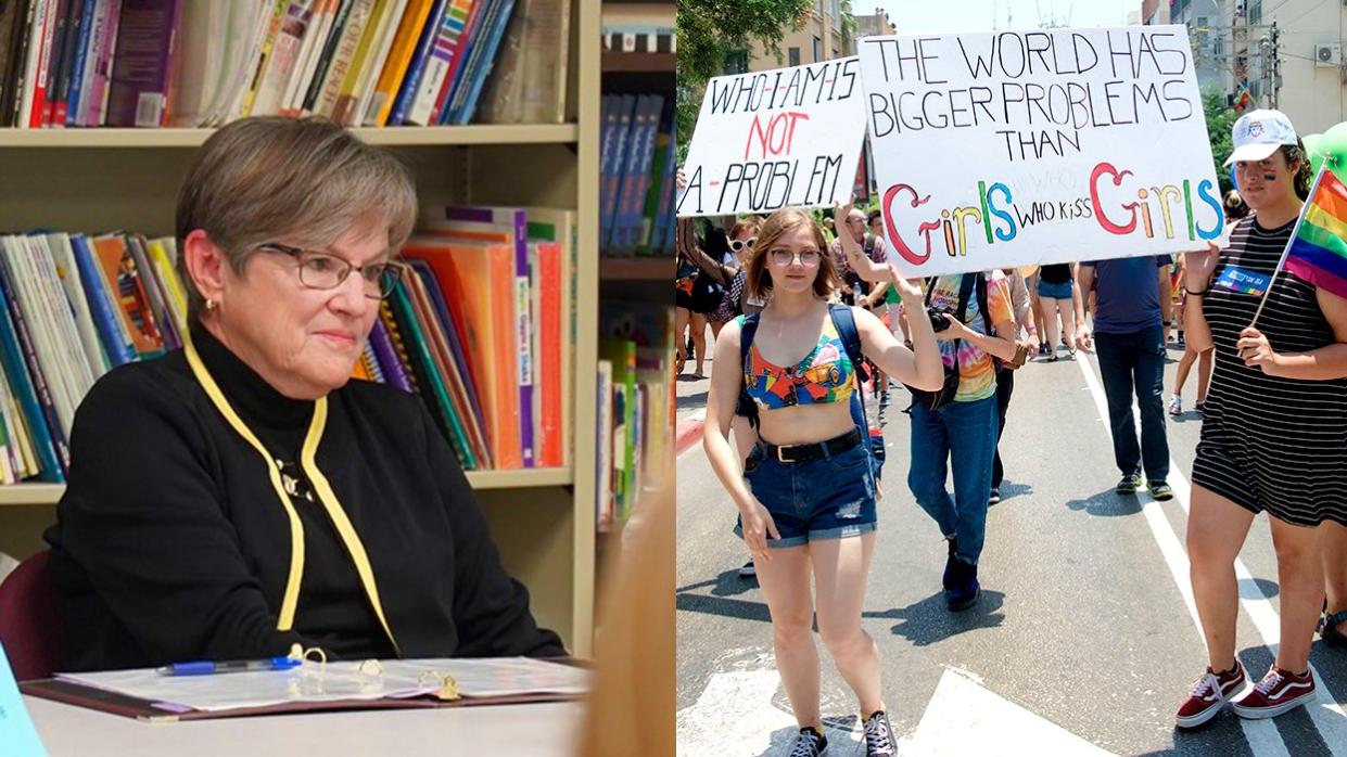 Kansas Governor Laura Kelly LGBTQ pride parade signs girls kissing no problem