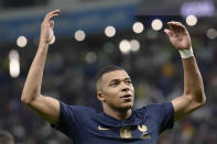 France's Kylian Mbappe celebrates after scoring against Australia during the World Cup group D soccer match between France and Australia, at the Al Janoub Stadium in Al Wakrah, Qatar, Tuesday, Nov. 22, 2022. (AP Photo/Christophe Ena)