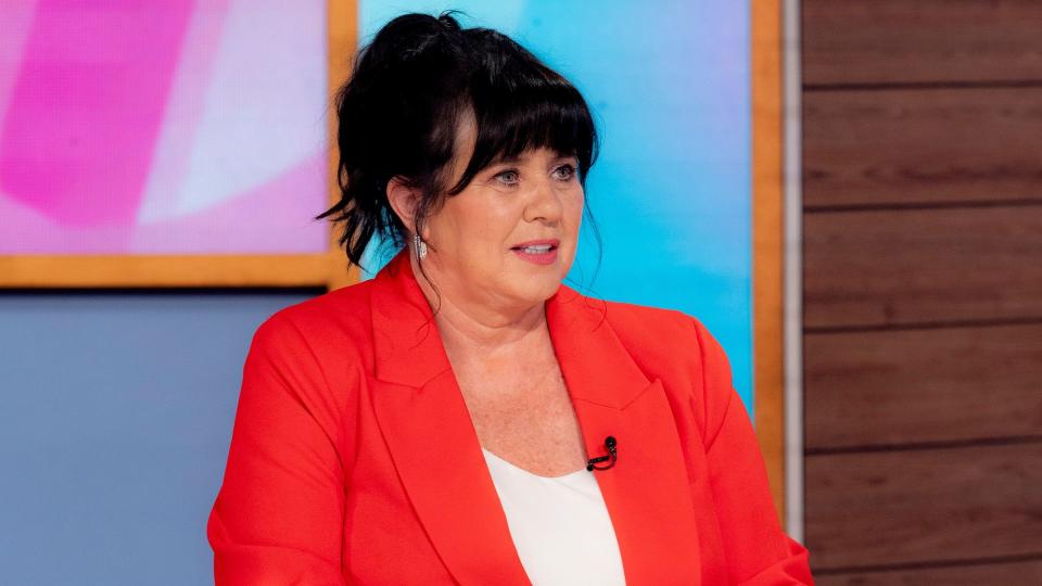 Coleen Nolan in an orange blazer