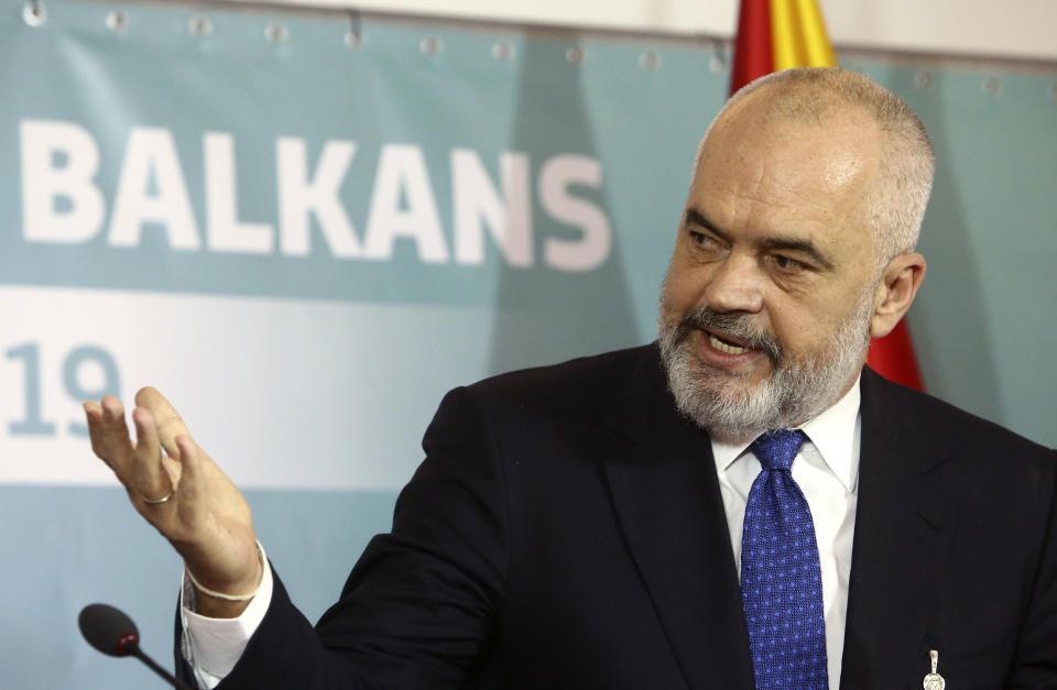 Albania's Prime Minister Edi Rama talks for the media during a joint news conference, following the Western Balkan leaders' meeting in the southwestern town of Ohrid, North Macedonia, Sunday, Nov. 10, 2019. Western Balkan leaders say they are committed to work closely and to remove administrative barriers for free movement of goods and people between their countries. (AP Photo/Boris Grdanoski)