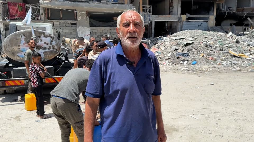 Hassan Kalash, pictured on June 12 in Jabalya refugee camp, in northern Gaza, says civilians are relying on thin water aid, as rights agencies warn of severe dehydration in the besieged territory. - CNN