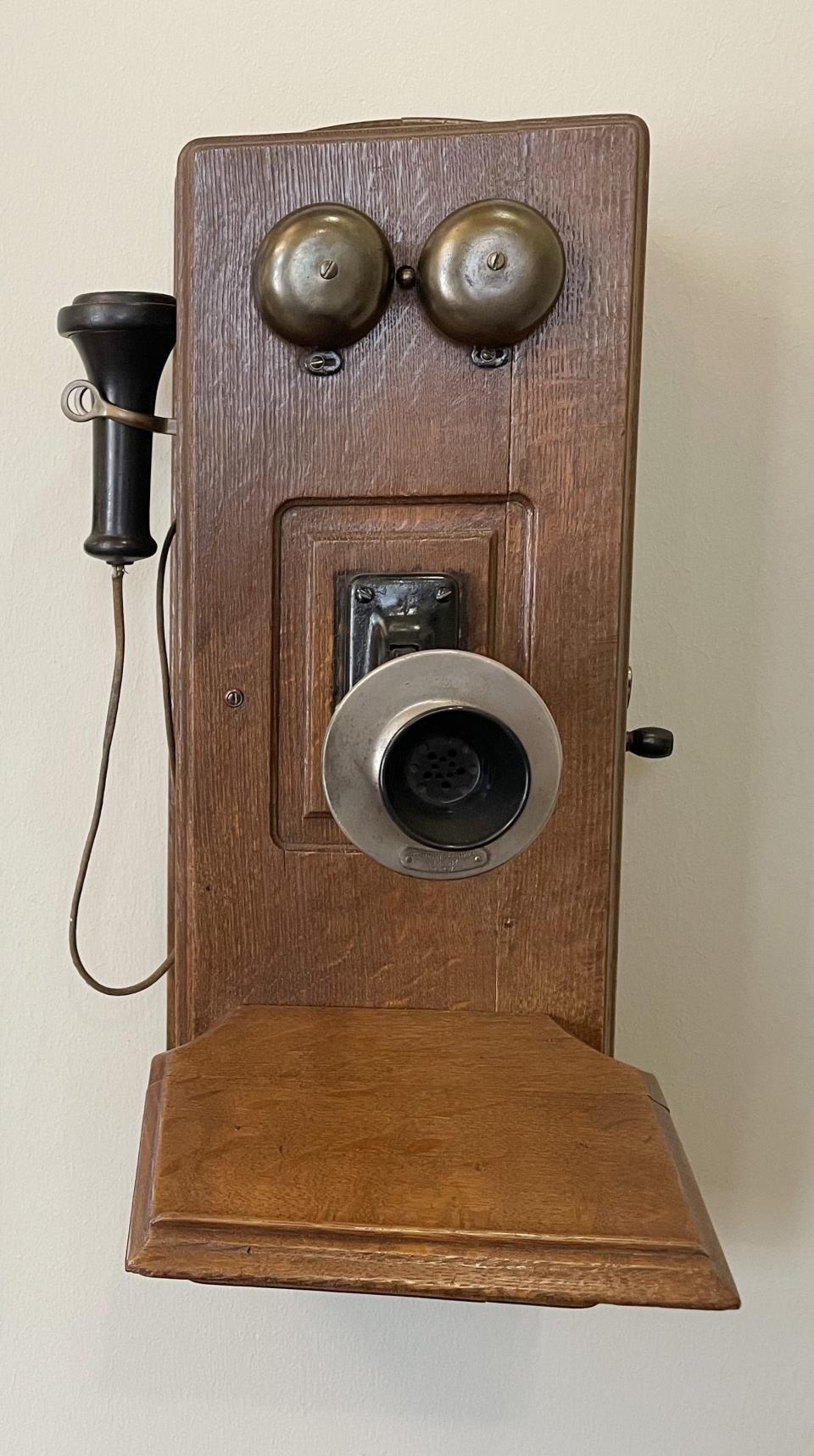 An old wall phone is on display at Pioneer Telephone Cooperative in Kingfisher, which is observing its 70th anniversary in 2023.