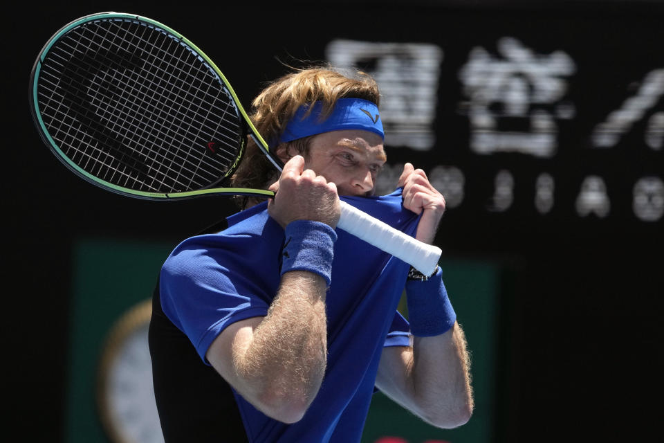 Andrey Rublev of Russia reacts during his third round match against Daniel Evans of Britain at the Australian Open tennis championship in Melbourne, Australia, Saturday, Jan. 21, 2023. (AP Photo/Ng Han Guan)